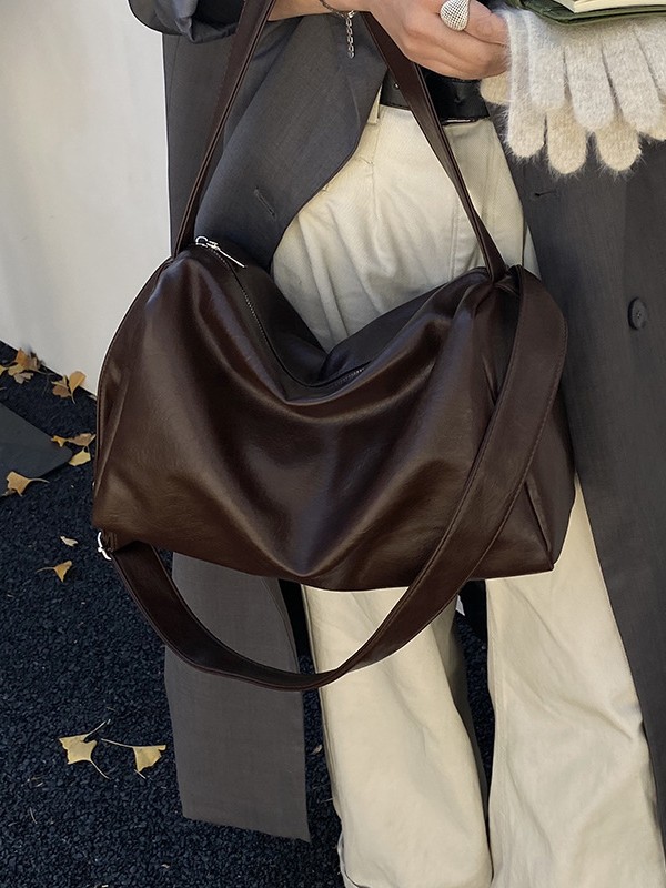 Nicho coreano simple bolsas de almohada de viaje mujeres otoño 2025 nueva gran capacidad extranjera diaria mochila de hombro