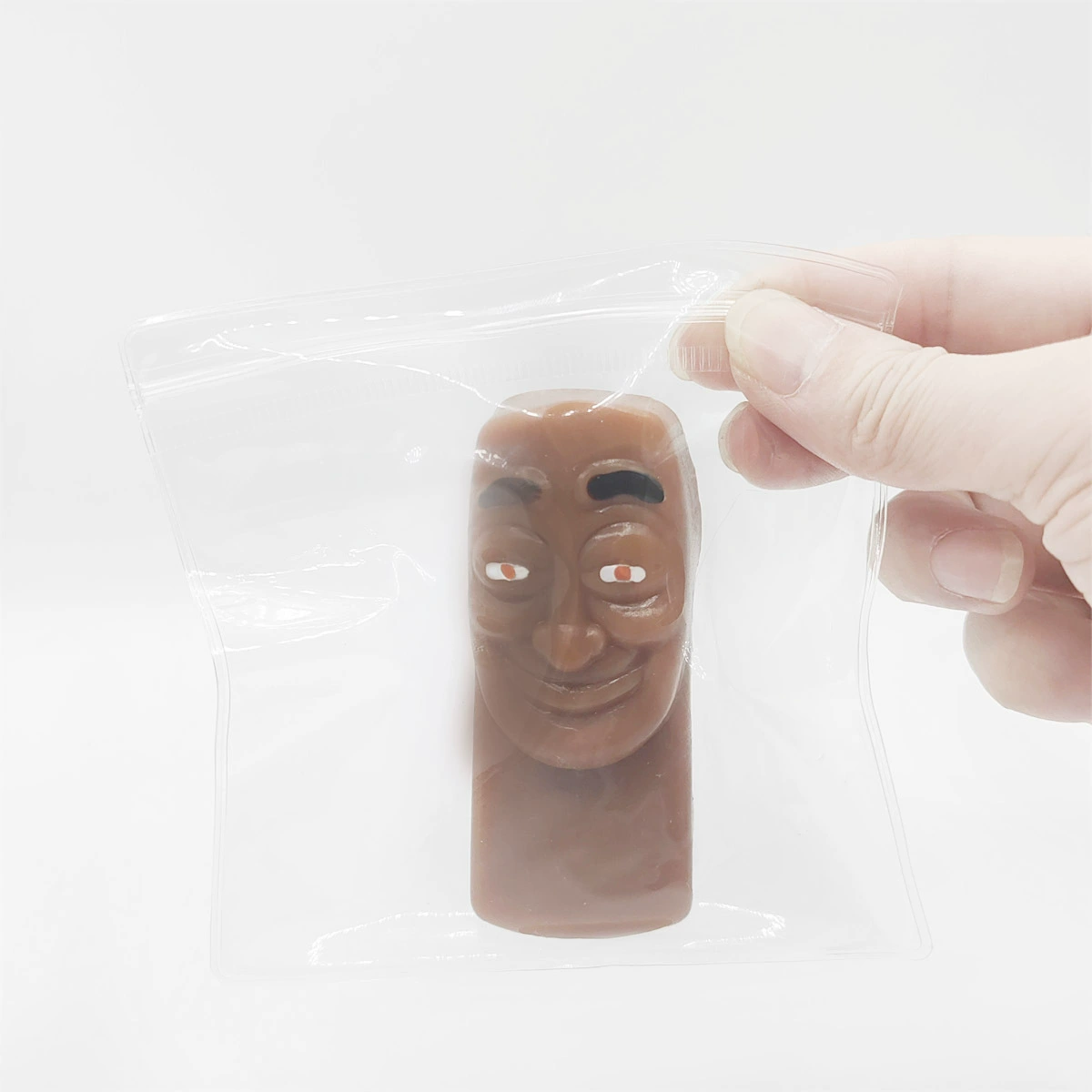 Antistress Slime Toy stick man, PVC bag packaging, optional syringe, brown or pink (0.2879 kg)