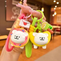 ラインの子犬のキーホルダーのメーカーの卸売りのネットの赤い爆発のデザートの頭は自動車の鍵の子供の小さい贈り物をかぶせます。