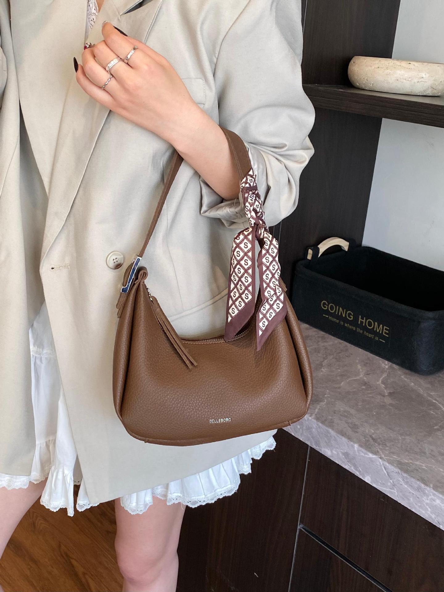 Bolso de axila coreano transfronterizo para mujer 2025 nuevo bolso de viaje simple casual de todo fósforo bolso de hombro de todo fósforo de alta gama