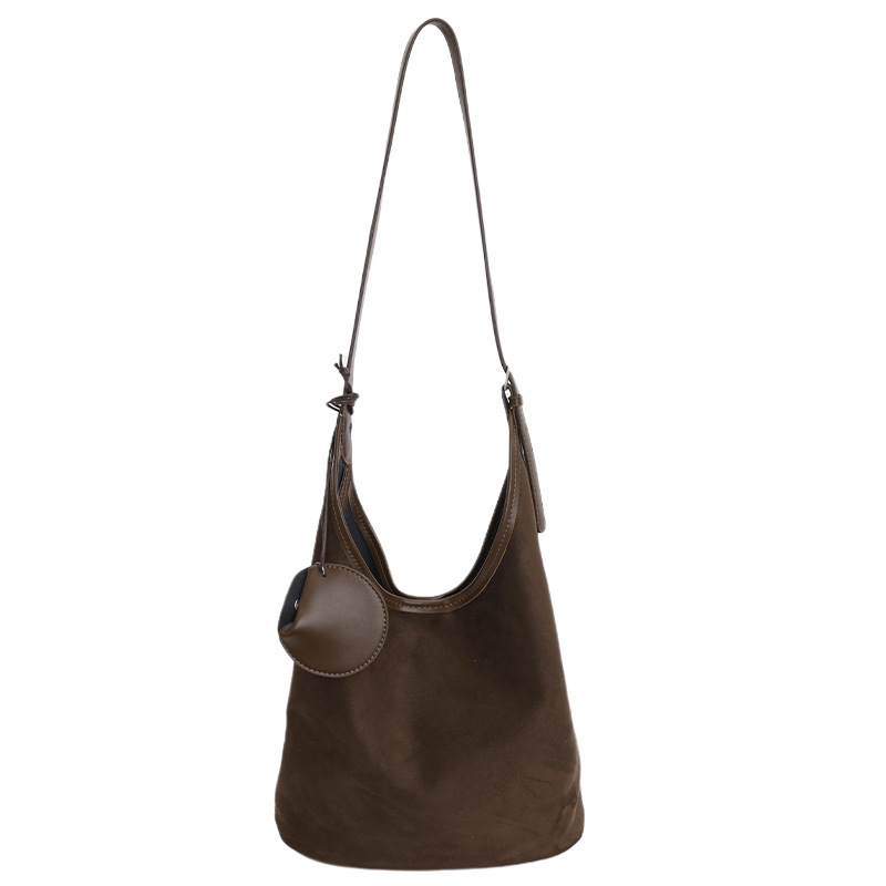 Bolsa de cubo retro transfronteriza para mujeres otoño y invierno 2025, nueva moda, bolso de hombro de moda, bolso de abrigo casual universal