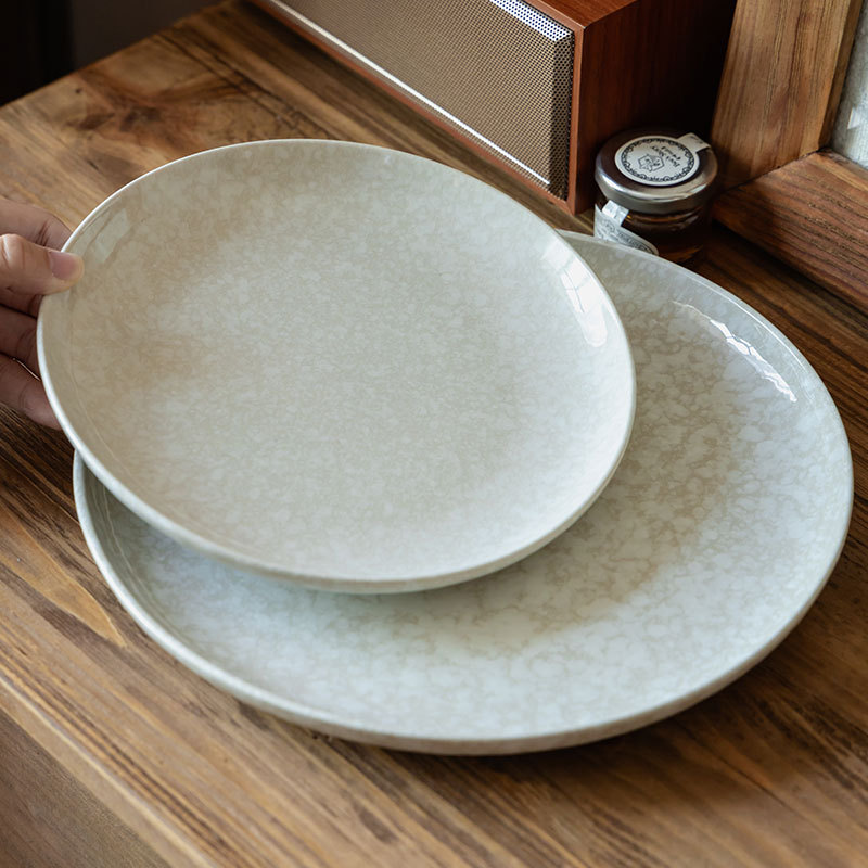 Plato de cerámica de alto valor de superficie, plato de piedra de nieve, plato de comedor doméstico, plato de platos, platos de platos de comedor al por mayor