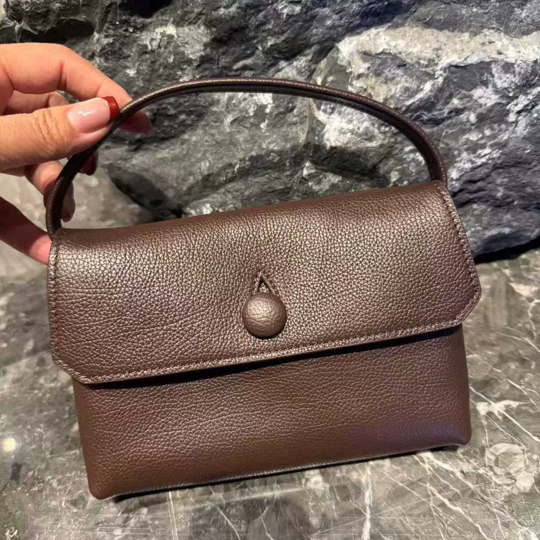 Sally 纽扣手提包真皮女包头层牛皮小方包手拿包时尚手机包包批发