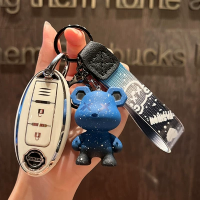 Xuanyi Tuda Loulan Bag | Car key bag - nissan-d-smart-3-key-single-shell-white-blue-violence-bear-pendant