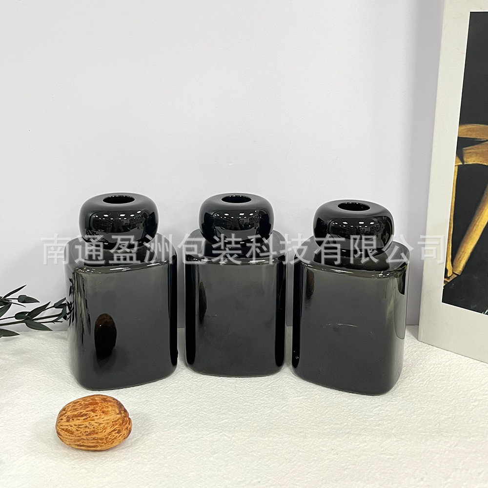 Nuevo producto al por mayor 100ml simple botella de vidrio aromática cuadrada botella de espuma de caña volatilizada botella de perfume interior botella vacía