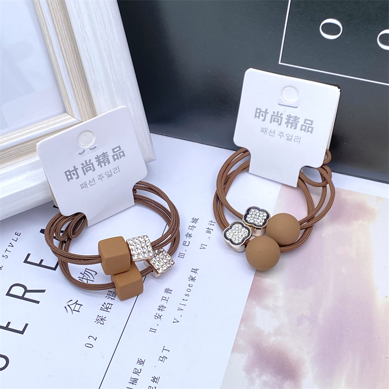 Nuevo estilo coreano etiqueta accesorios para el cabello 2 Tarjeta montada cuerda de pelo simple café leche té cristal cuerda de pelo banda de goma