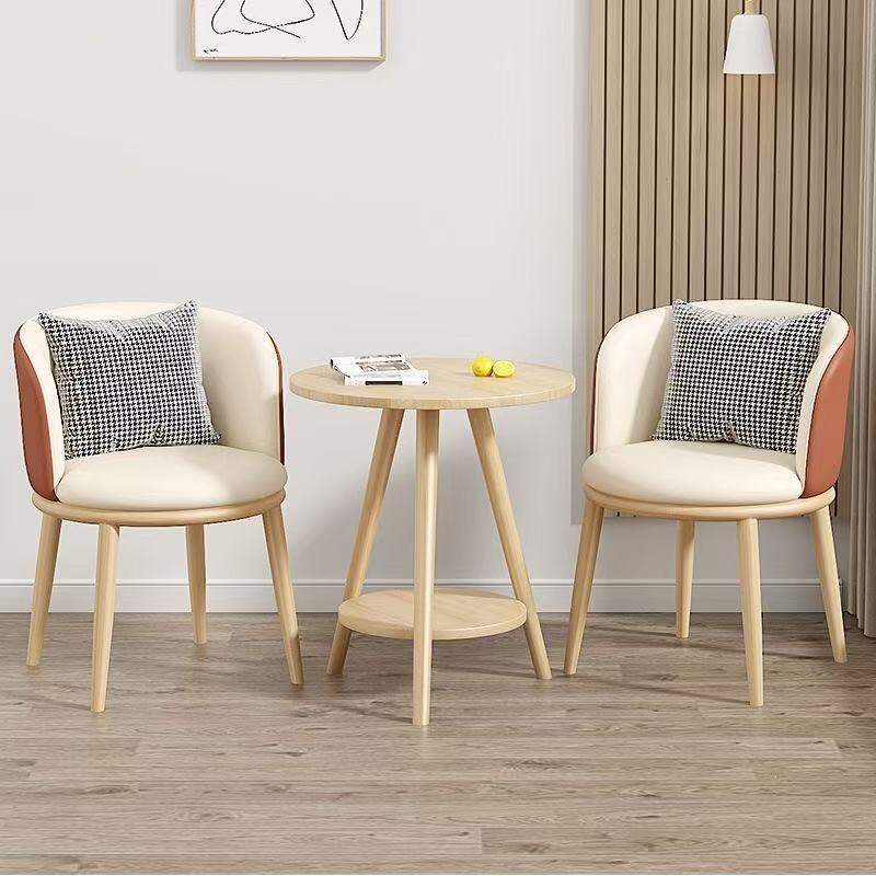 Simple Nordic-style leisure armchairs with solid wood frames and soft upholstery, suitable for balconies, tea tables, and both home and commercial use