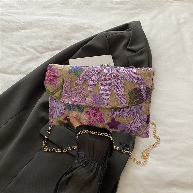Red de alta calidad de moda cadena de hombro mochila de verano 2025 nuevo estilo versátil bolso de sobres de sequillas para mujeres