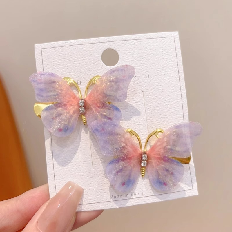 4 un par de mariposas en polvo gris