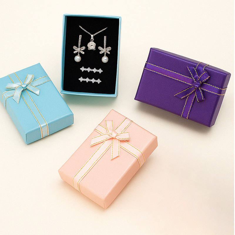 Papel perlado Phnom Penh Bowknot Cinta Caja de papel 5*8 Tapa del cielo Caja de almacenamiento de joyería Caja de regalo de embalaje de joyería