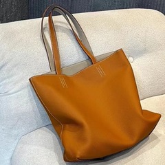 2025 新トートバッグ第一層牛革 TOGO カーフスキンショッピングバッグポータブル本革大容量バケツ女性のバッグ
