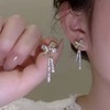 Fashionable earrings with bow from pearl, Korean style, wholesale