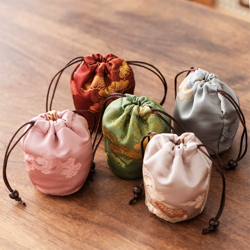 Tea cup, organizer bag for home use, handheld teapot, storage system