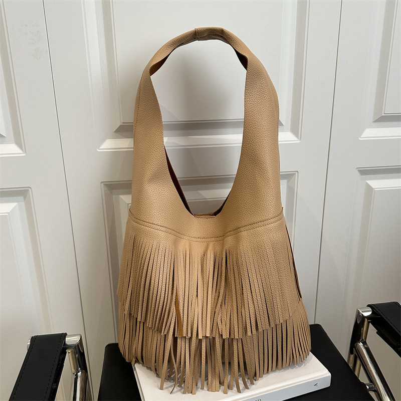 Bolsa coreana de bordas 2025, nueva moda de gran capacidad retro bolso de viaje relajado bolso axilar