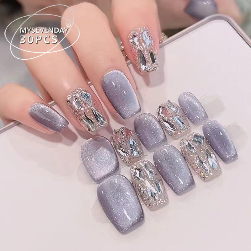 Wearable nail art with a high-end, sophisticated blue cat-eye design; handmade nail tips for autumn and winter; new nail tips for the New Year