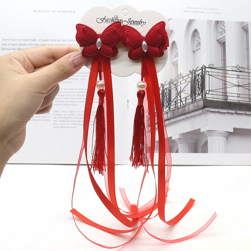 Children's hair accessory with tassels