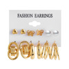 Golden earrings, set with pigtail, 2023, European style, suitable for import