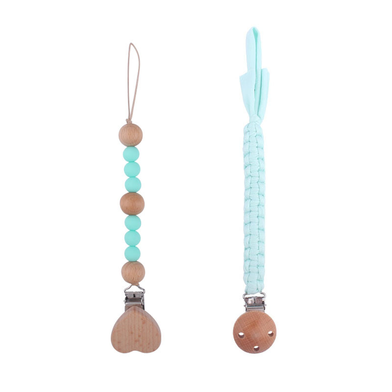 Nuevos suministros para bebés Beech Love Clip calmante bebé tela de algodón anti-gota Cadena de silicona perlas pezón cadena traje