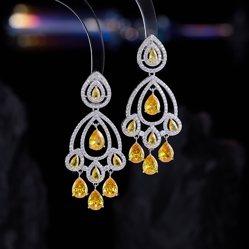 Geometric long elegant earrings drop-shaped with zircon for bride