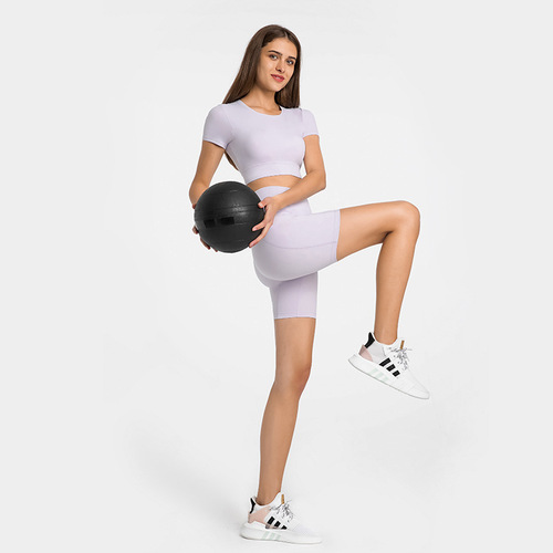 Spring and summer new style stitched side pocket sports quarter pants for women with high waist and hip lift elastic tight fitness yoga shorts