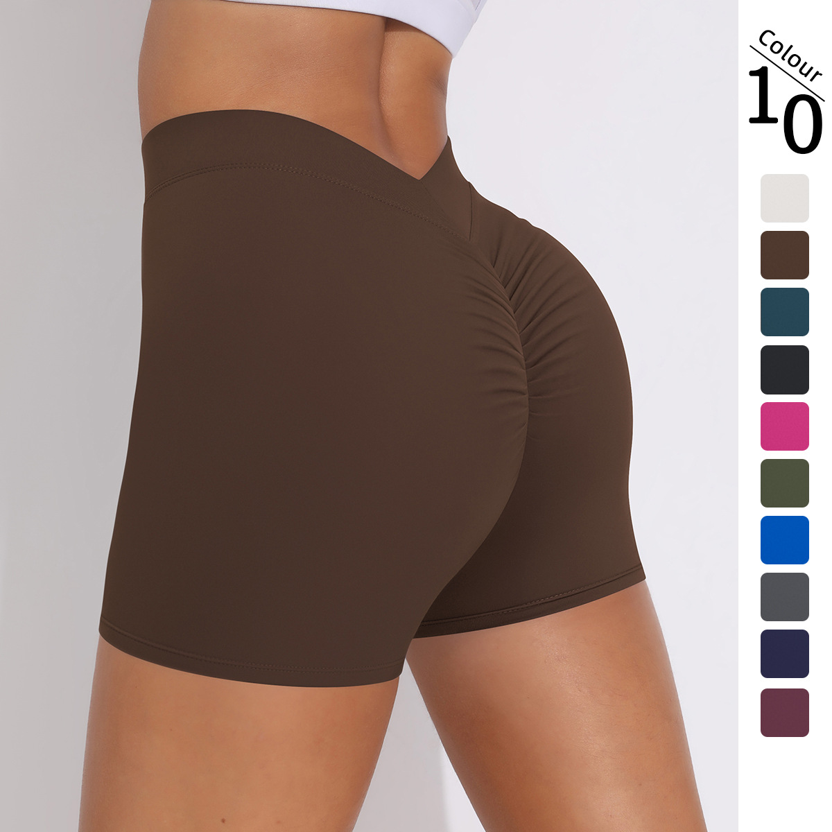Lifting transfronterizo V cintura pliegues color sólido melocotón cadera pantalones cortos de yoga deportes correr fitness pantalones ajustados mujeres