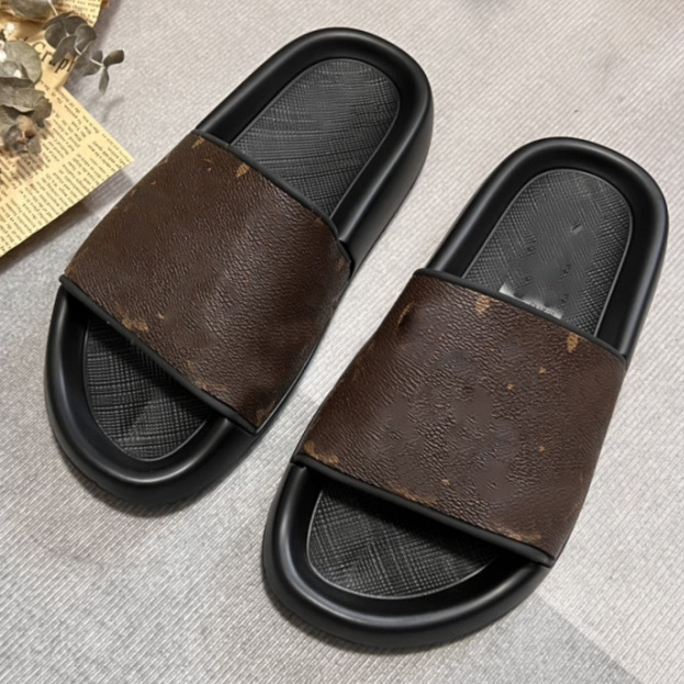 高バージョンの夏の新型の茶色のエンボスのフラットスリッパの女性の本革のファッションの外は丸い頭の1字の牛革を着て涼しいです。|undefined