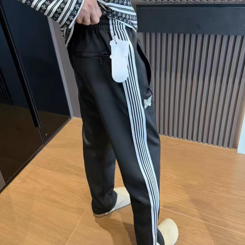 Cross-border embroidered butterfly pants with black and white side stripes, unisex sports casual pants, college couple style wholesale