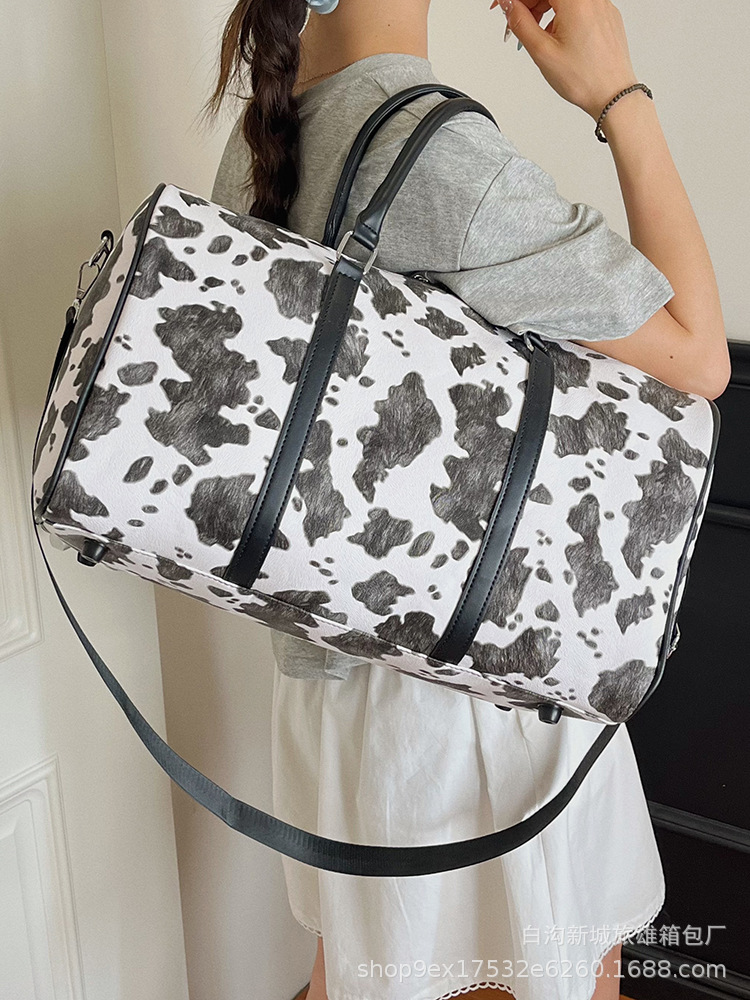 Nueva bolsa de viaje con patrón de vaca al por mayor bolsas de entrenamiento clásicas de gran capacidad de mano bolsas de embarque bolsas de almacenamiento image 3