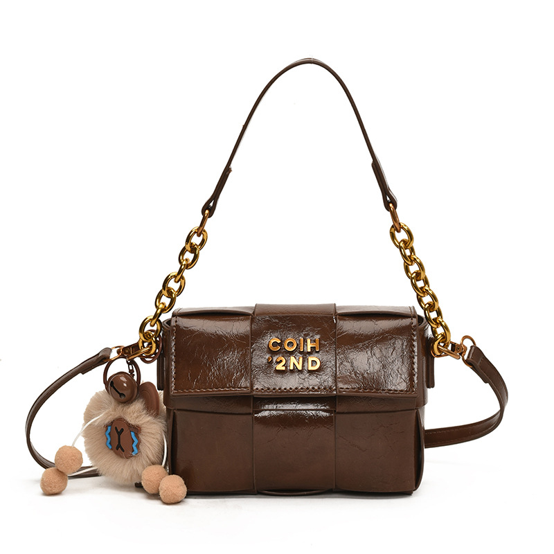 Bolso tejido de cuero de cera de aceite de alta calidad para mujer 2025 primavera nueva moda casual bandolera de moda de nicho