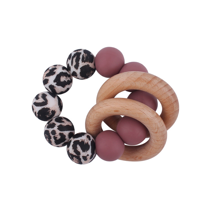 Nuevo bebé suministros de silicona leopardo cuentas mordedor pulsera calmante bebé DIY mordedura de silicona juguete de haya