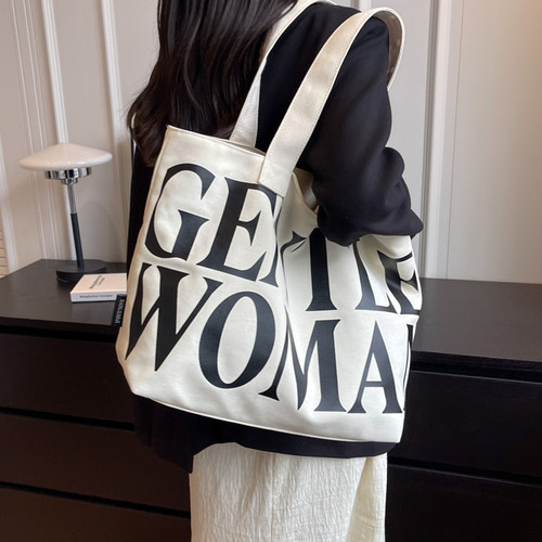 大容量字母帆布托特女包新款都市简约单肩包文艺上课学生布袋