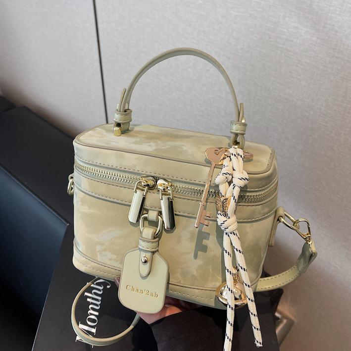 Este año, la popularidad de la bolsa de mano para mujeres 2025, nueva bolsa de hombro de tendencia universal, alta humedad, bolsa de cubo de moda