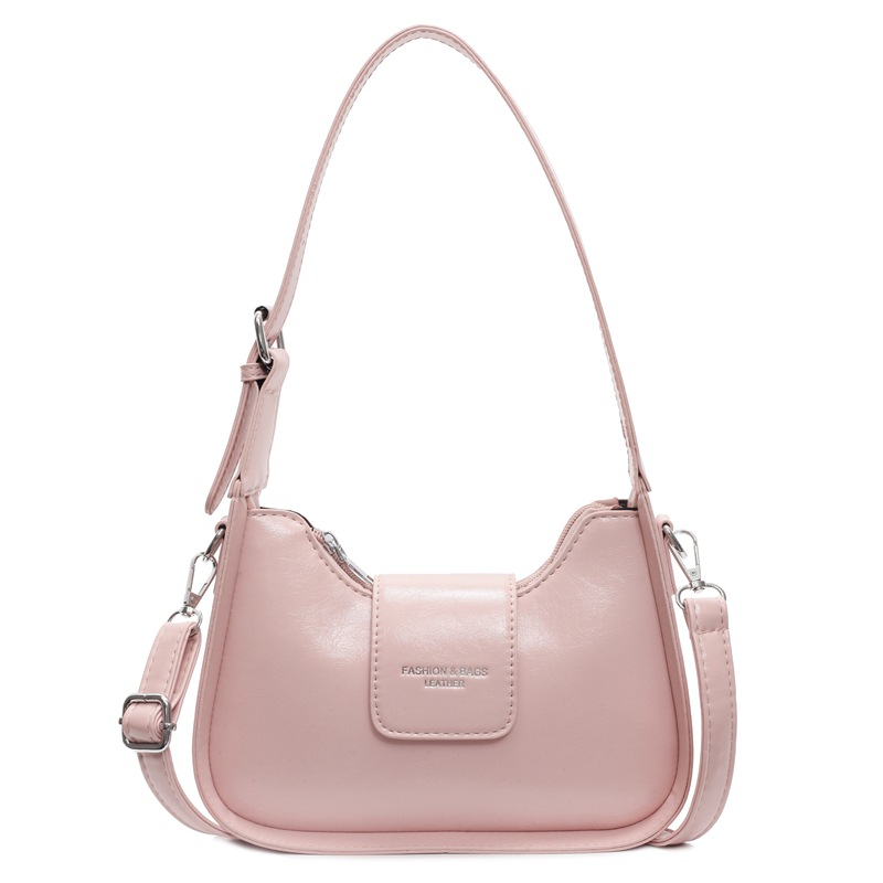 Nicho Zhong simple y versátil bolso de brazo para mujeres 2025, nuevo estilo de moda casual bolso de hombro de alta sensación bolso de media luna de mano