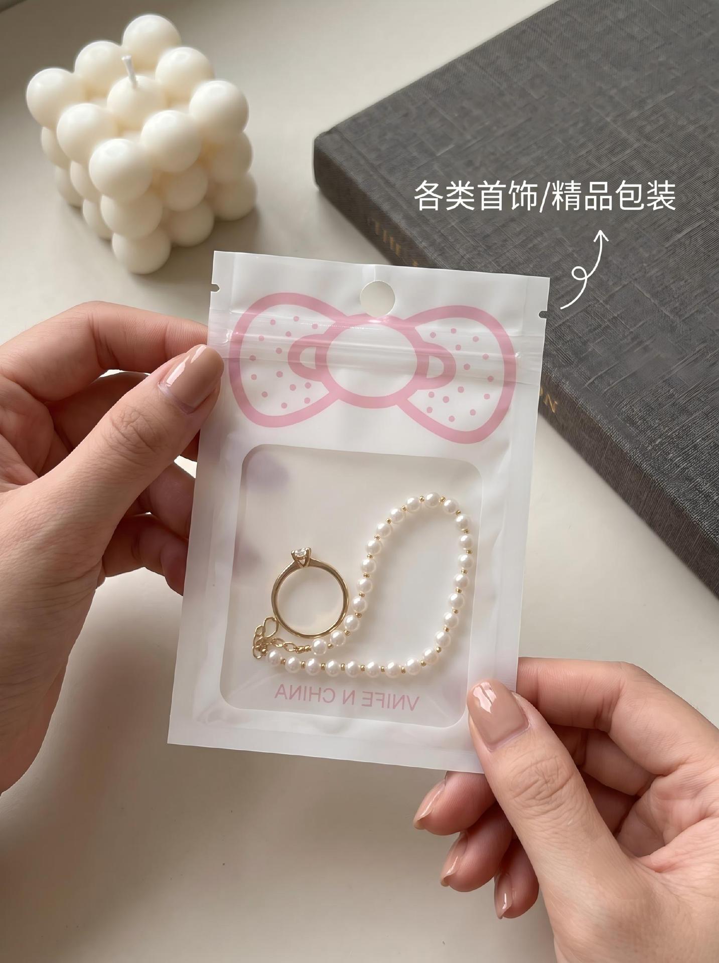 Selbstversiegelnde Beutel niedliches Cartoon-Design Instagram-Stil Verpackungs-Verschlussbeutel für Handyhüllen kleine Accessoires Schmuck Aufbewahrung Verpackungsbeutel Lagerbestände