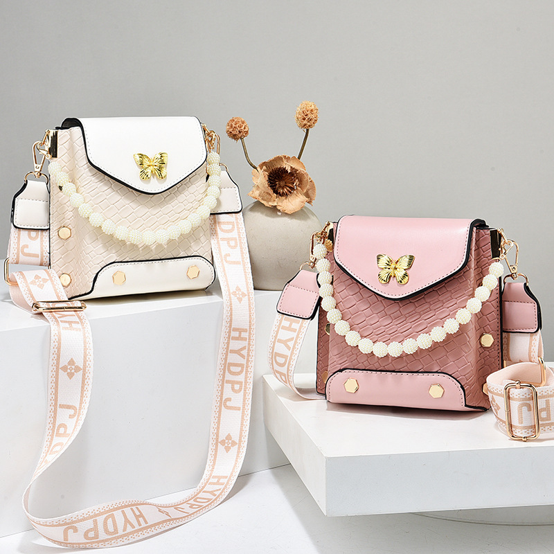 Otoño y invierno bolso de teléfono móvil de mujer 2025 nuevo estilo de moda bolso de hombro de moda universal mini bolso de aire exterior