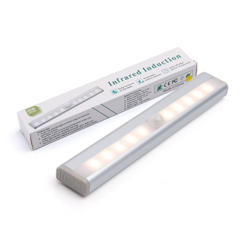 Fuente fabricante recargable luz nocturna luz de sensor de cuerpo humano led inteligente luz de armario de pared luz de armario de succión magnética de batería