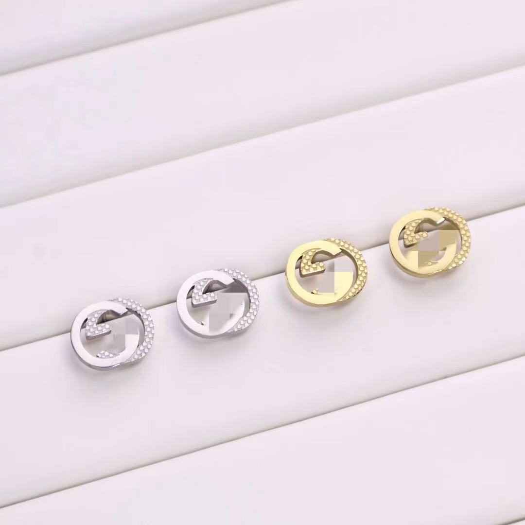 Sophisticated fashionable classic earrings with letters