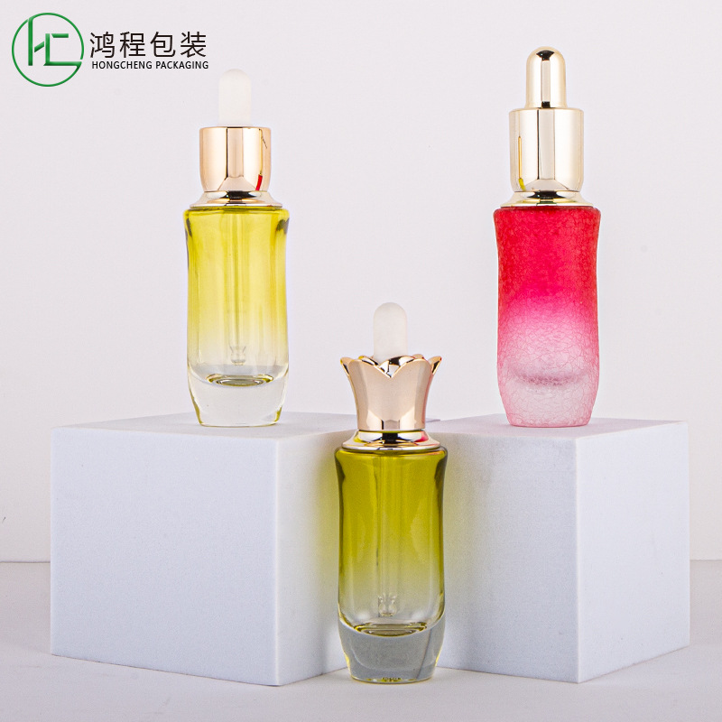 厂家供应现货精油瓶30ml精华液瓶平肩滴管电镀压泵化妆品分装空瓶