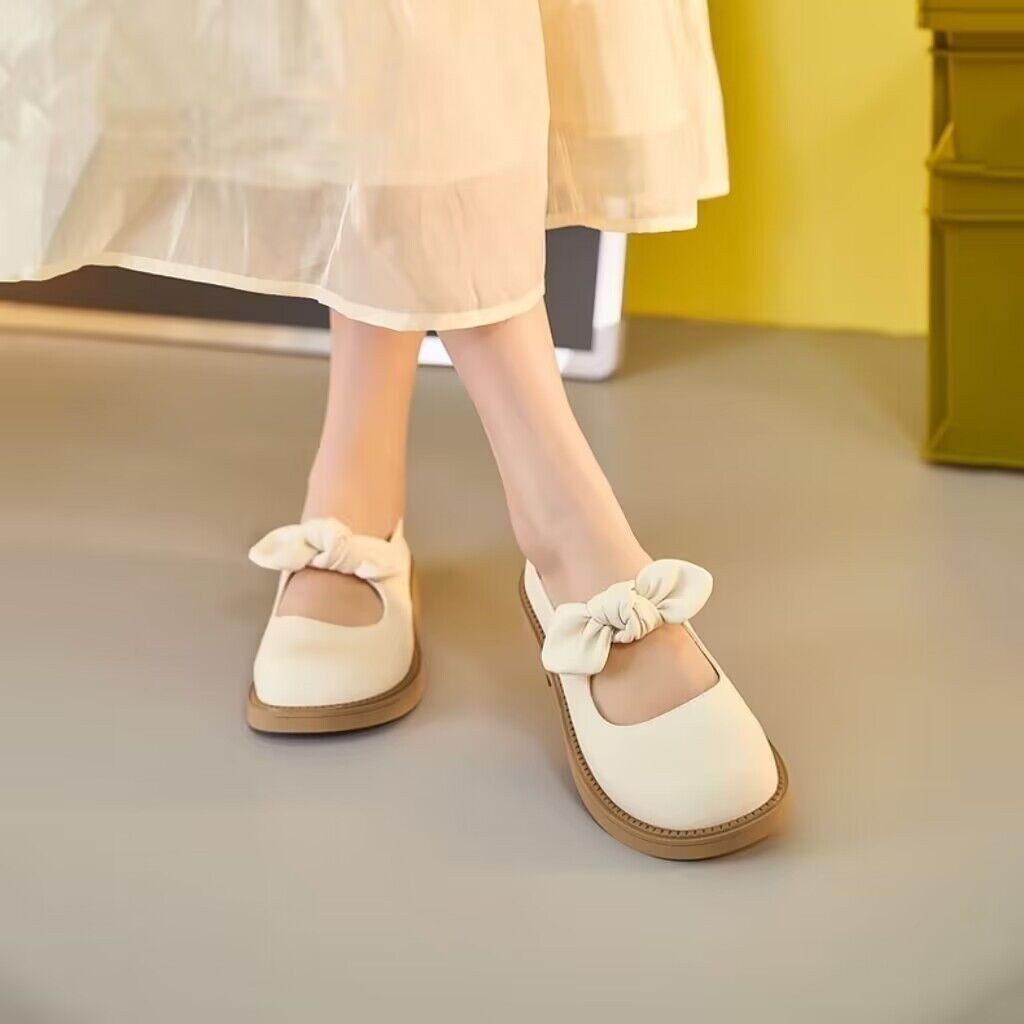 Zapatos de cuero retrógrados franceses para mujeres 2026 nuevo arco superficial verano perezoso zapatos de moda de una sola pie