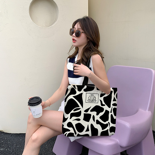 Wholesale canvas bags for female students in class bags, large capacity handbags, one shoulder, versatile fashion shopping bag manufacturer