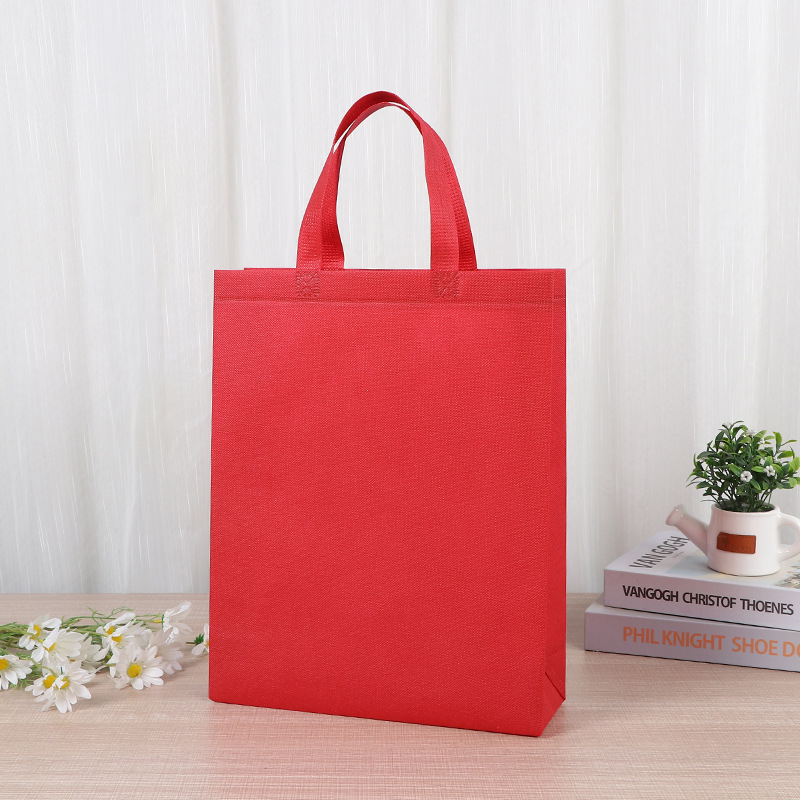 Bolsa de mano no tejida de color vertical en stock para aumentar el embalaje de regalo en blanco imprimible logotipo bolsas no tejidas