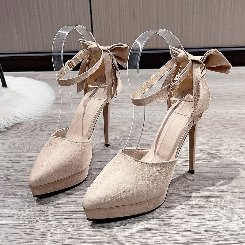 Black autumn high heels with bow