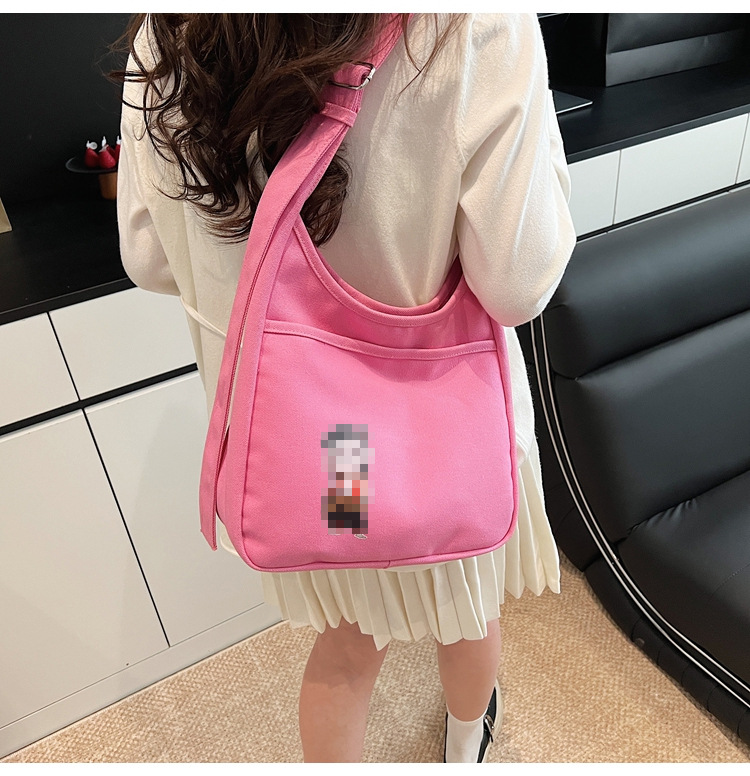 2025 nuevo bolso de lona bolso de hombro de gran capacidad para mujer bolso casual de todo fósforo para estudiantes en clase bolso de viaje