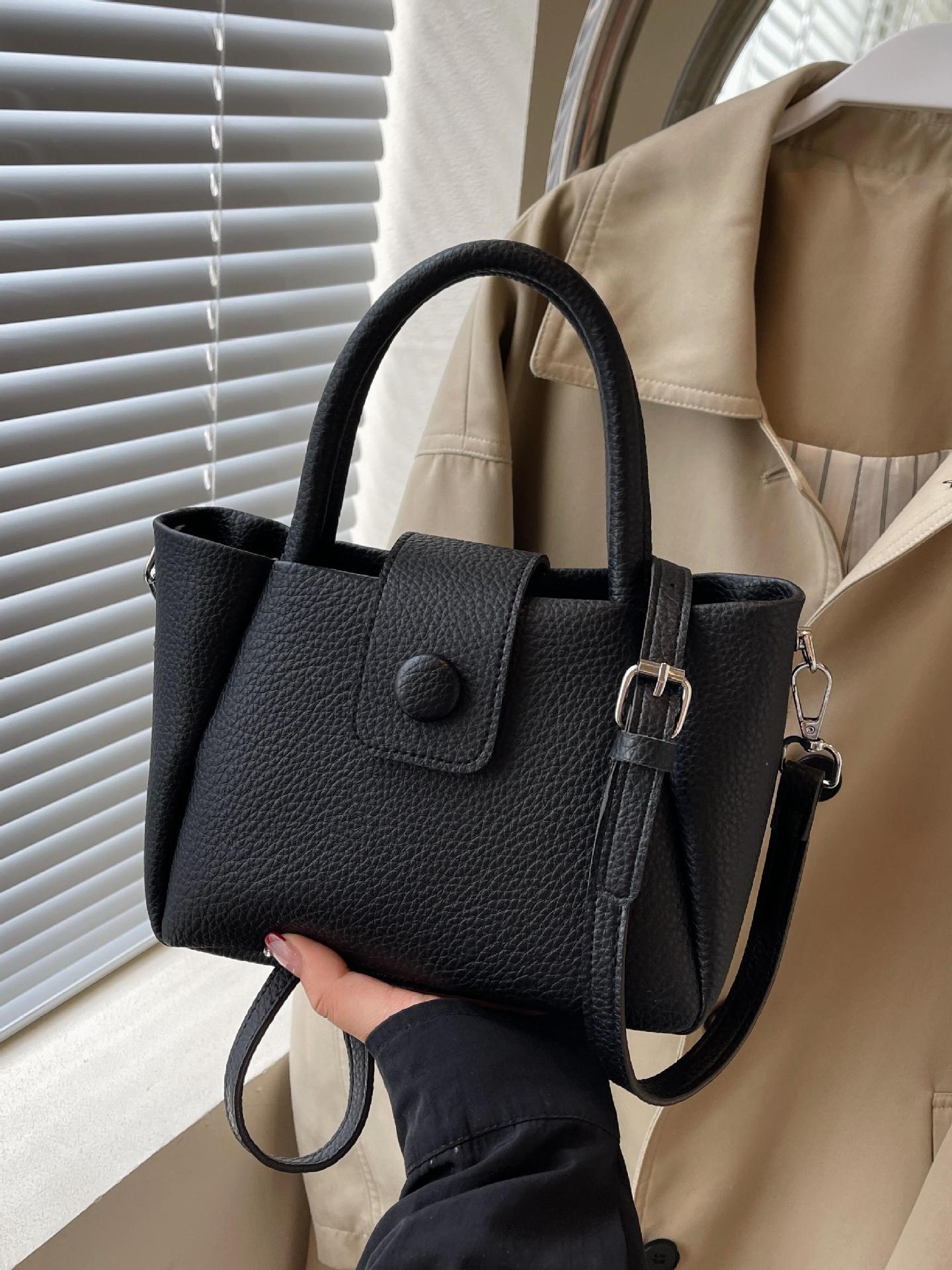 Bolso de mano de comercio exterior para mujeres 2025 nuevo tipo de bolso de mochila simple casual de moda versátil de alta calidad bolso de cubo de hombro