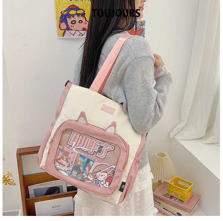 The new cute cartoon printed student bag with a large capacity and transparent student storage single-shoulder bag is selling well for women undefined