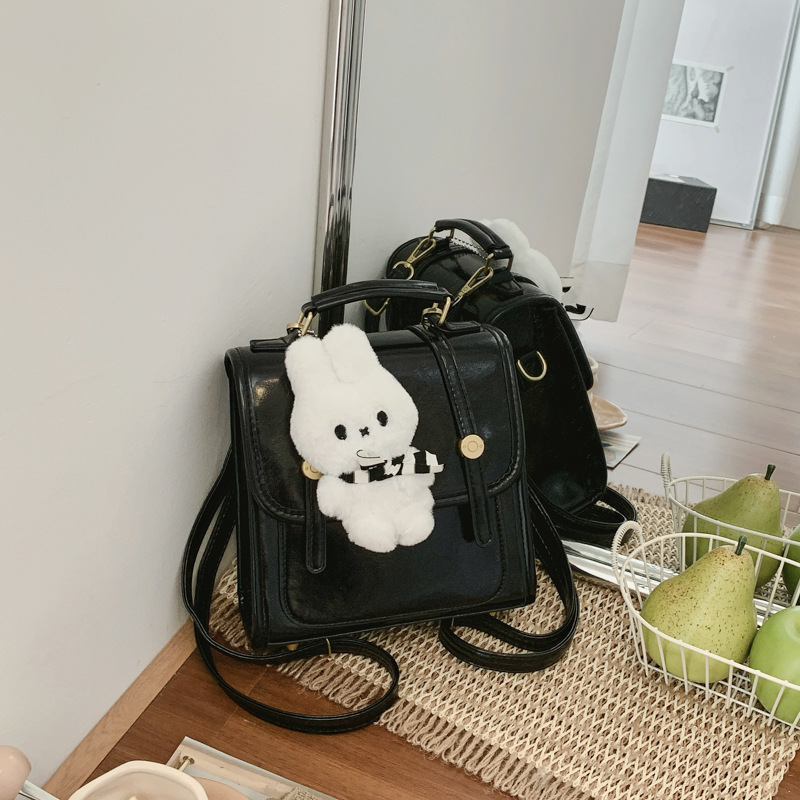 Cantos colgantes de dibujos animados de hombro pequeño bolso de mujer de verano estilo coreano nicho color sólido mochila mujer