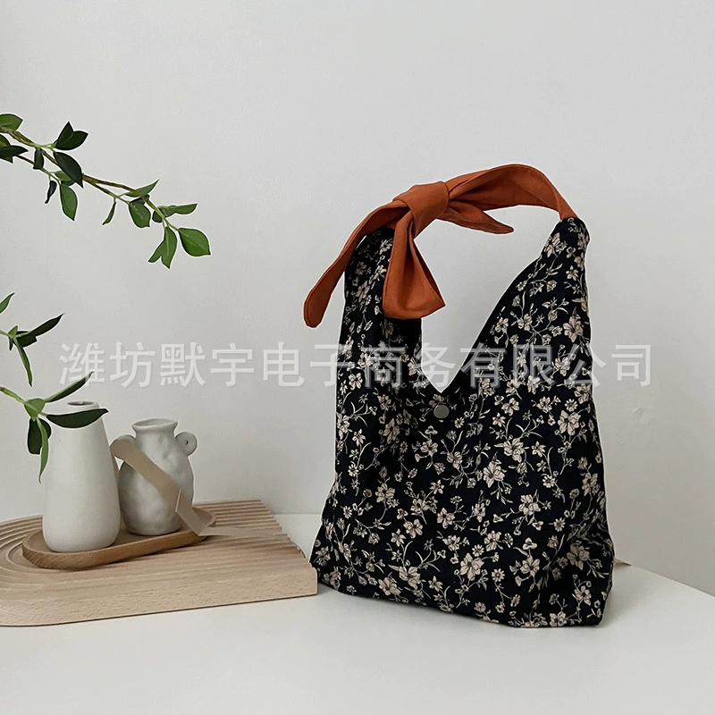 布凡良品 Small design cute black one-shoulder bag for traveling with bow