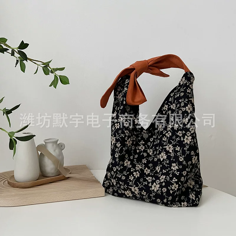 布凡良品 Small design cute black one-shoulder bag for traveling with bow