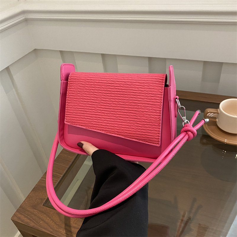 Bolsos de brazo de textura coreana retro mujeres 2025 primavera nueva moda de nicho de alta capacidad bolso de hombro