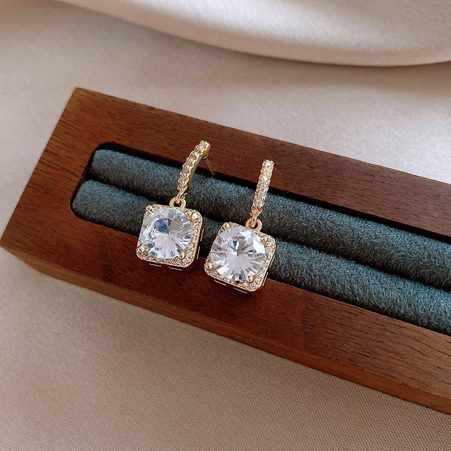 Temperamento de pendientes verdes pendientes ligeros lujosos de alto nivel sensación de pendientes zircon flores joyas geométricas al por mayor fábrica